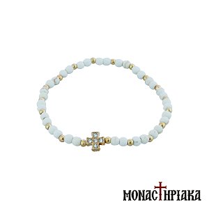 Bracelet with White Beads and Gold Cross