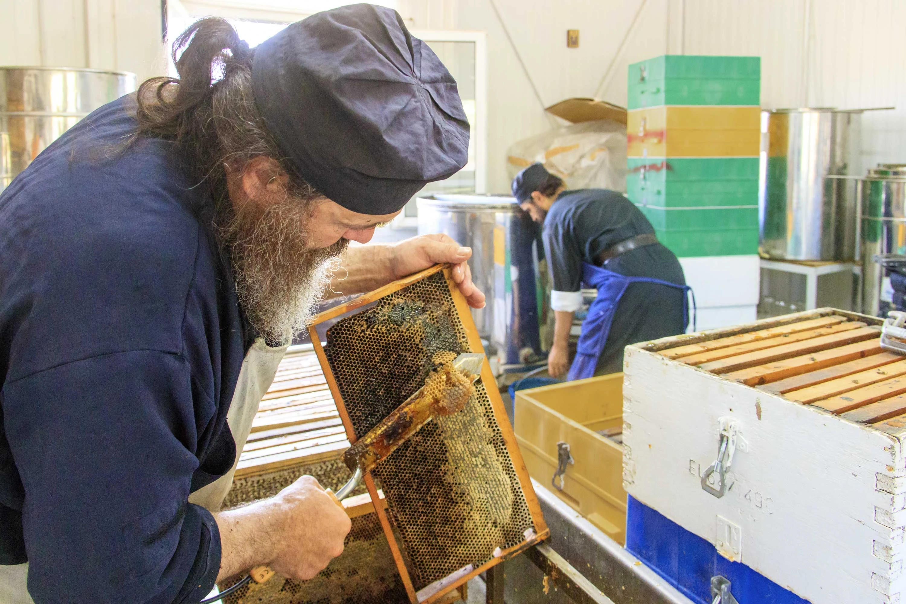 Fathers of Mount Athos working on honey hives